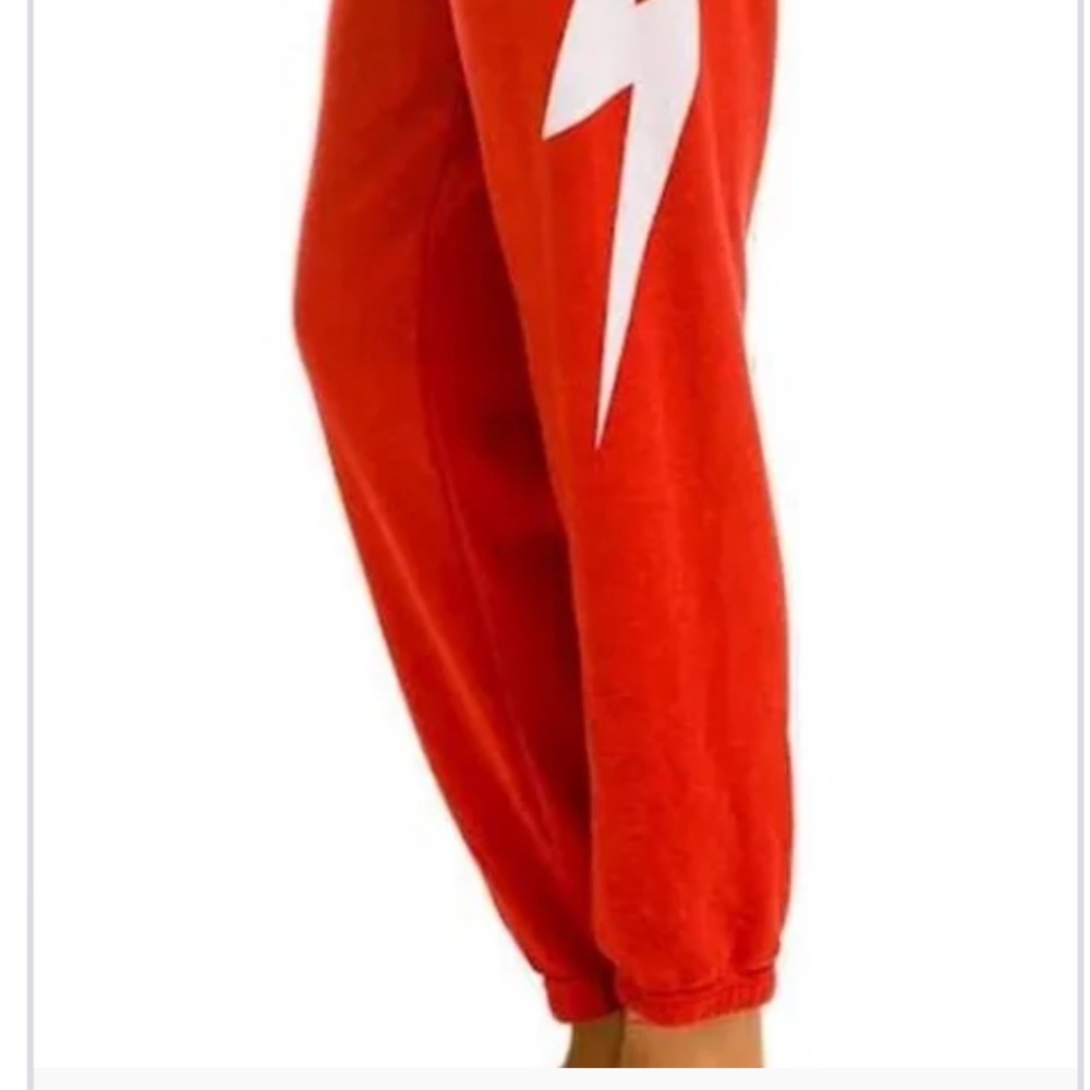 Red Joggers with White Lightning Bolt